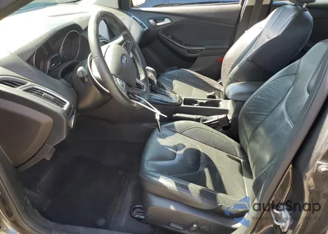 2015 Ford Focus Titanium from USA, damaged, VIN 1FADP3J29FL274552